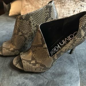 Calvin Klein heels. Size 10. Black and olive green snakeskin print!